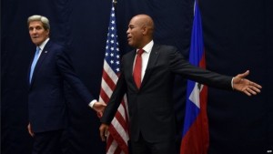 John Kerry, left, Michel Martelly, right.