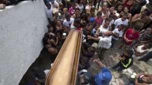 A large crowd followed Eduardo Victor's coffin to his funeral service