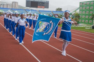 Photo 5 - 2017 March Past winners, Carenage Girls Government Primary, impress the judges with their eyes right at last year's Games